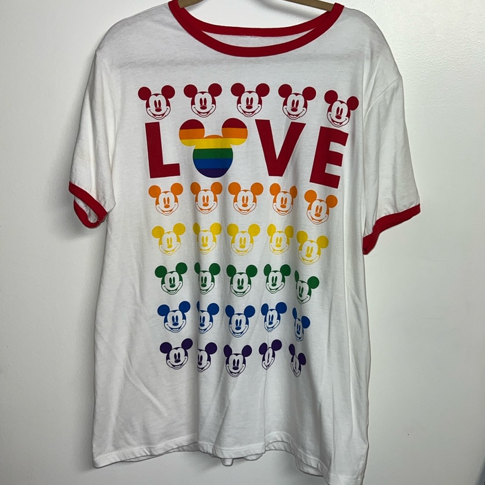 Disney PLUS 2X 2021 Pride shirt with red trim and rainbow Mickey print